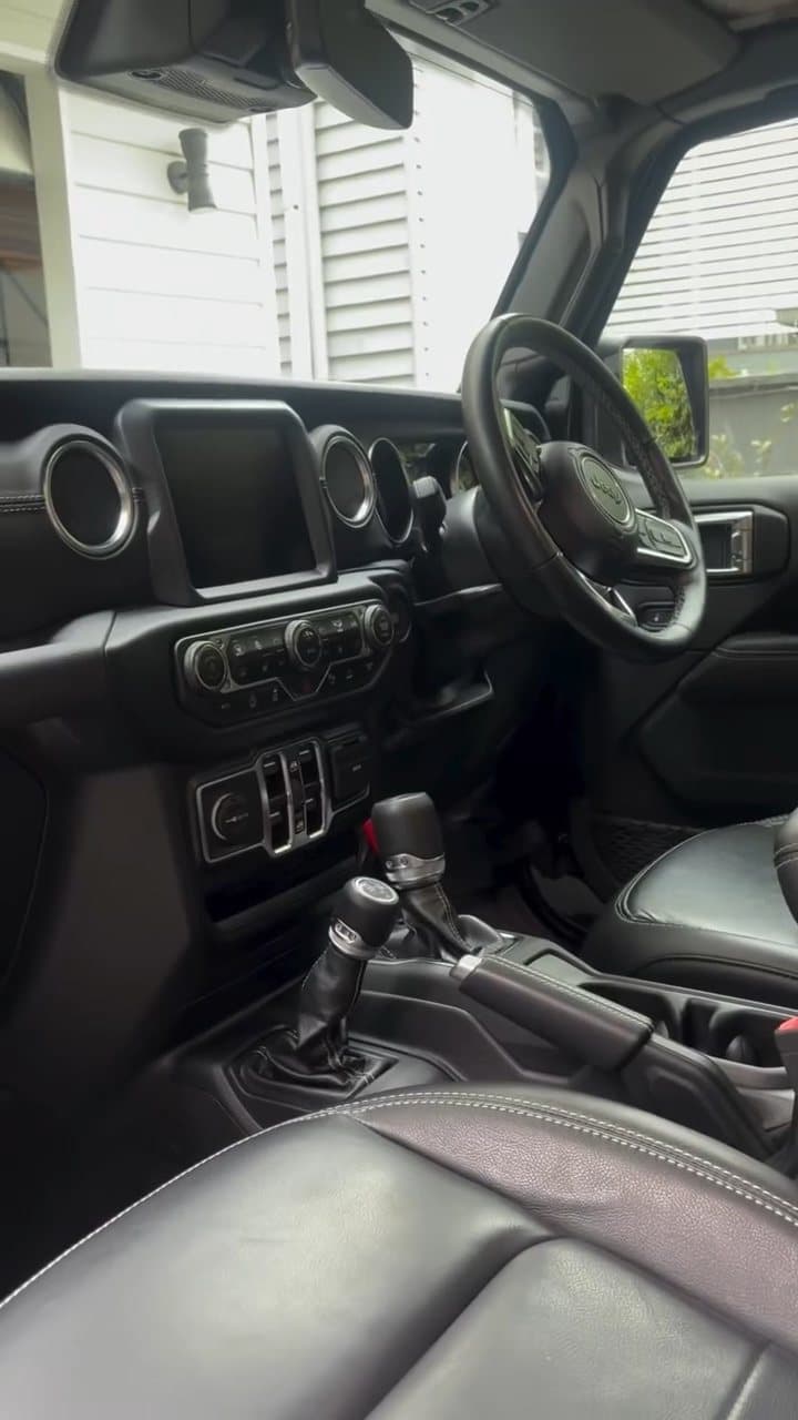 Dash and front seats of a Jeep Wrangler after a full interior detail